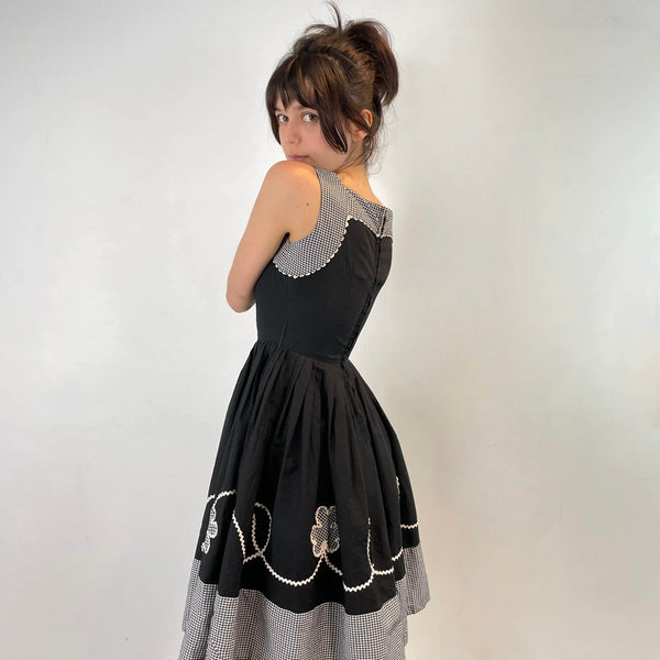 Back and side view of 1950s Black and White Cotton Petite Dress size Extra-Small sold on bohemevintage.com Montreal