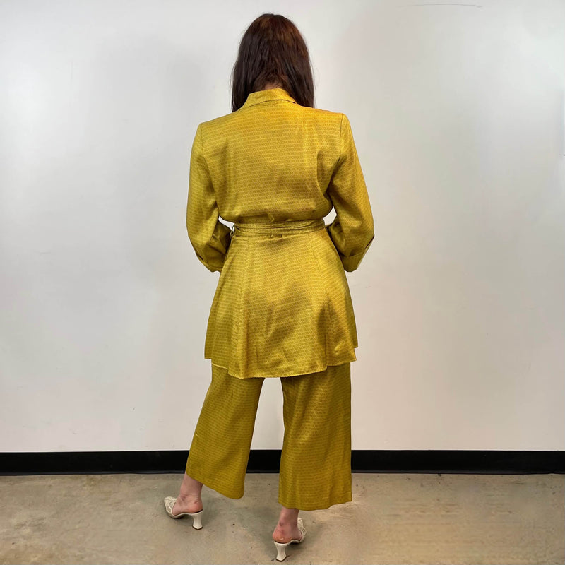 Back view of 1950s Gold Satin Robe and Pants Loungewear Set Size Small/Medium sold at bohemevintage.com Montreal