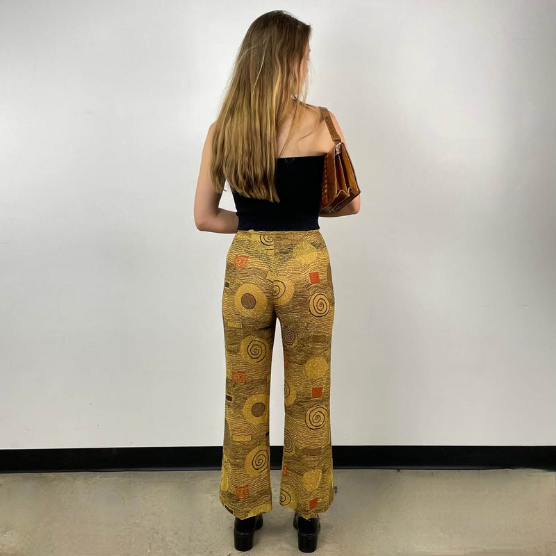 Back view of Pants from 1960s/70s Gold Patterned Mini Dress and Pant Set Size small sold at bohemevintage.com Montreal