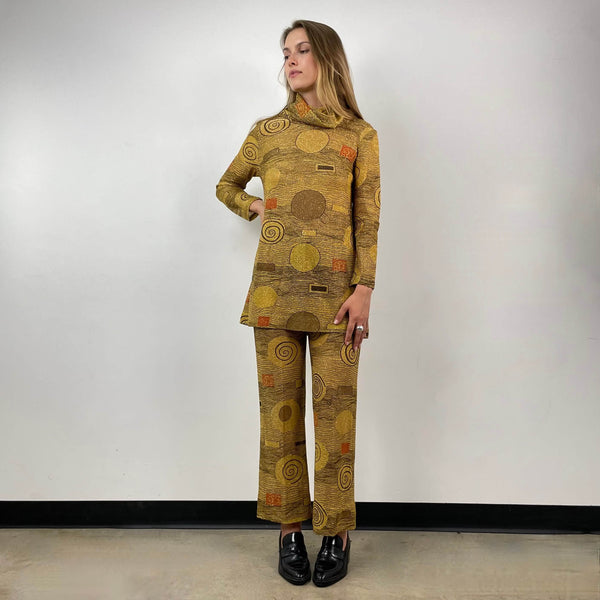 Front view of 1960s/70s Gold Patterned Mini Dress and Pant Set Size small sold at bohemevintage.com Montreal