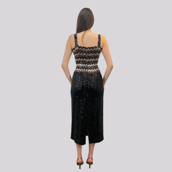 Back view of 1970s Black Sequin Midi Dress Small-Medium sold by bohemevintage.com Montreal