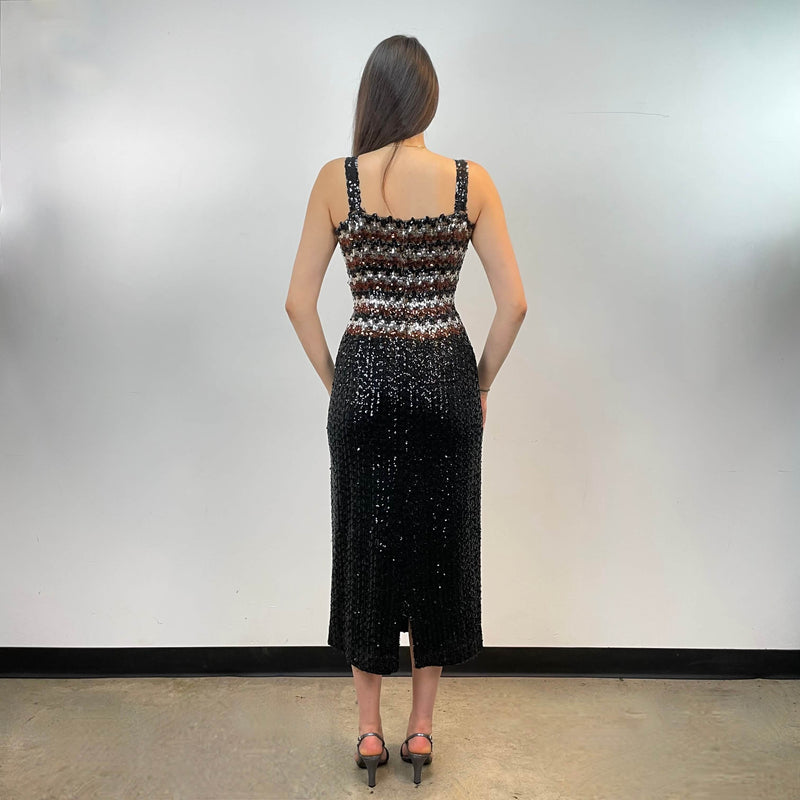 Back view of 1970s Black Sequin Midi Dress Small-Medium sold by bohemevintage.com Montreal