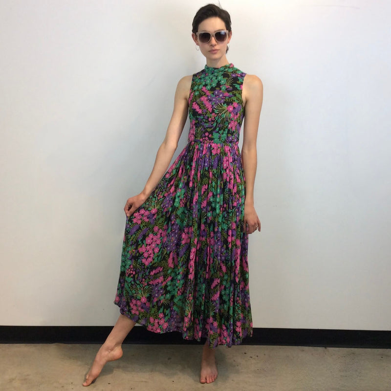Front view of 1970s Floral Print Wide Leg Jumpsuit Size Small sold at bohemevintage.com Montreal