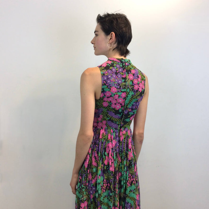 Back view of 1970s Floral Print Wide Leg Jumpsuit Size Small sold at bohemevintage.com Montreal