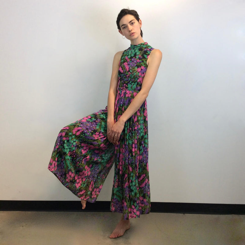 Front view of 1970s Floral Print Wide Leg Jumpsuit Size Small sold at bohemevintage.com Montreal