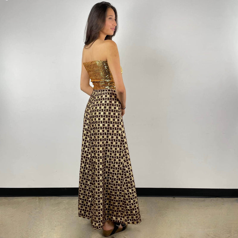 Side view of 1970s Gold Brocade Flared Maxi Skirt Size small / Medium sold at bohemevintage.com Montreal
