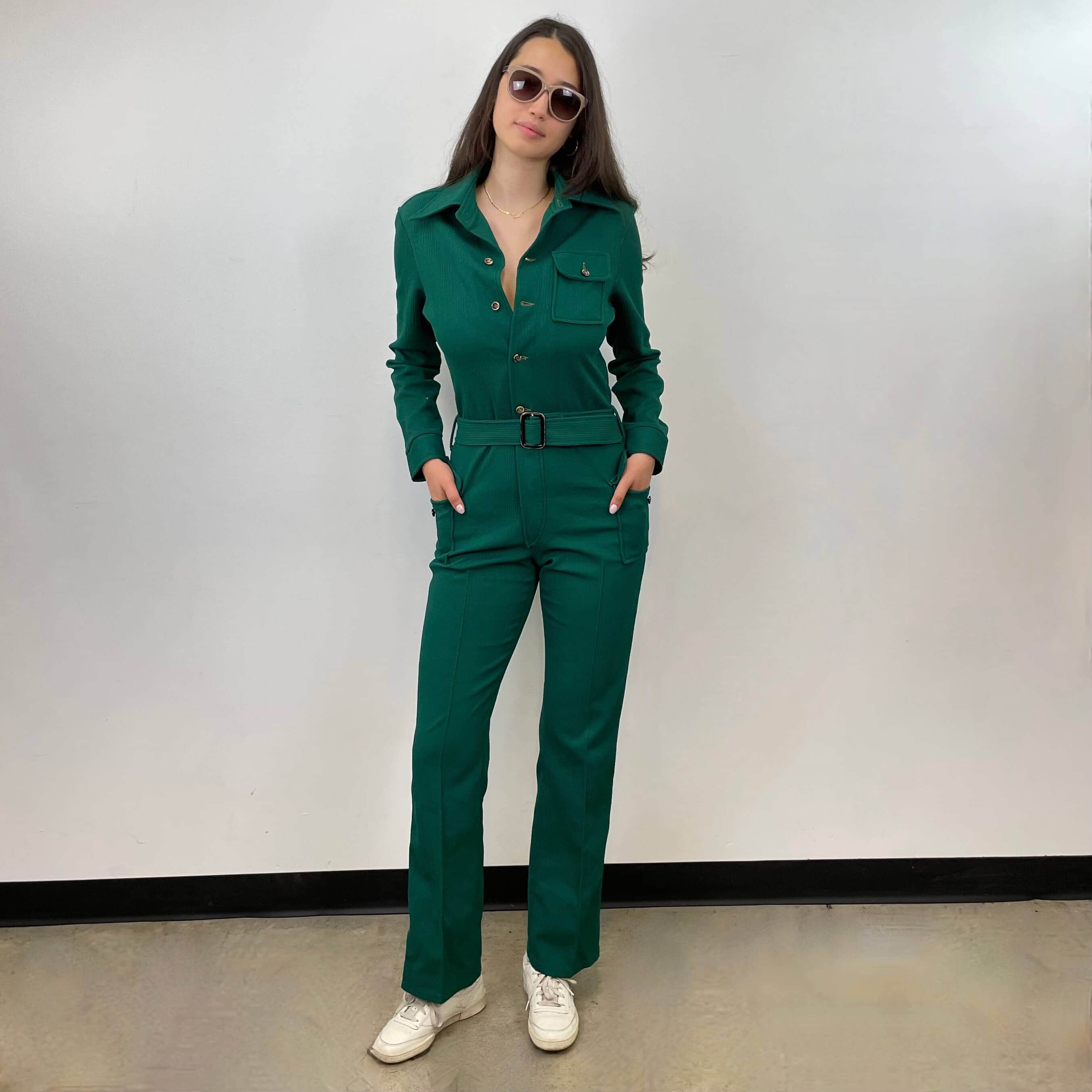 Front view of 1970s Long Sleeve Green Jumpsuit Size Medium sold on bohemevintage.com Montreal