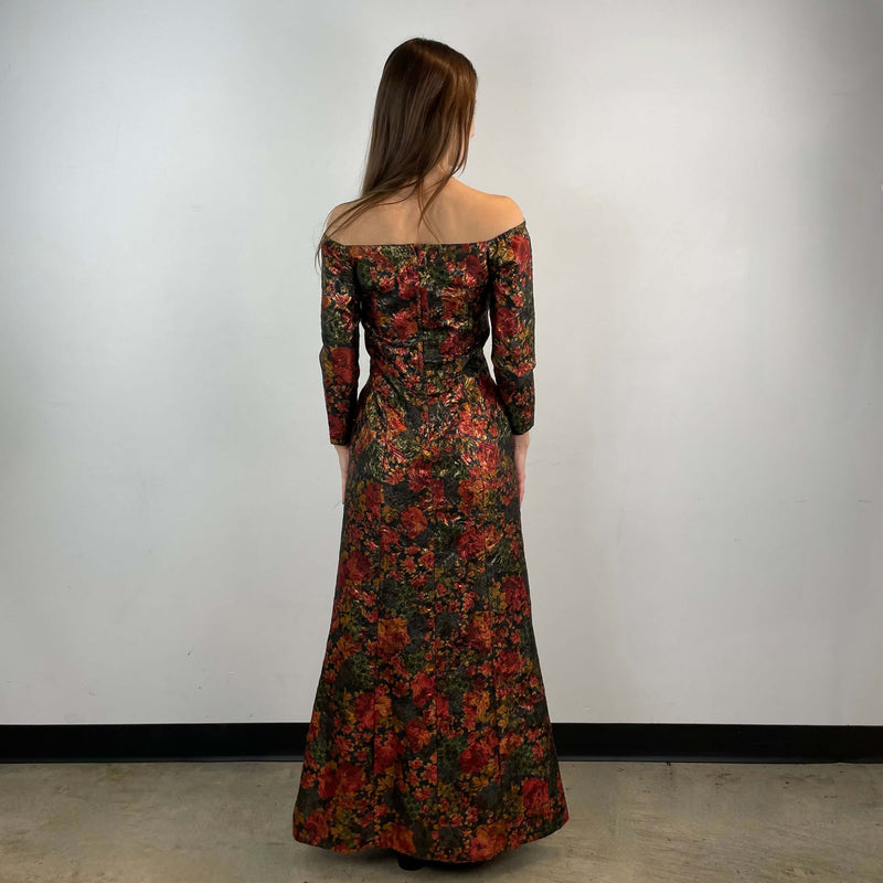 Back View of 1970s Off-the-Shoulder Metallic Brocade Gown Size Small/Medium sold at bohemevintage.com Montreal
