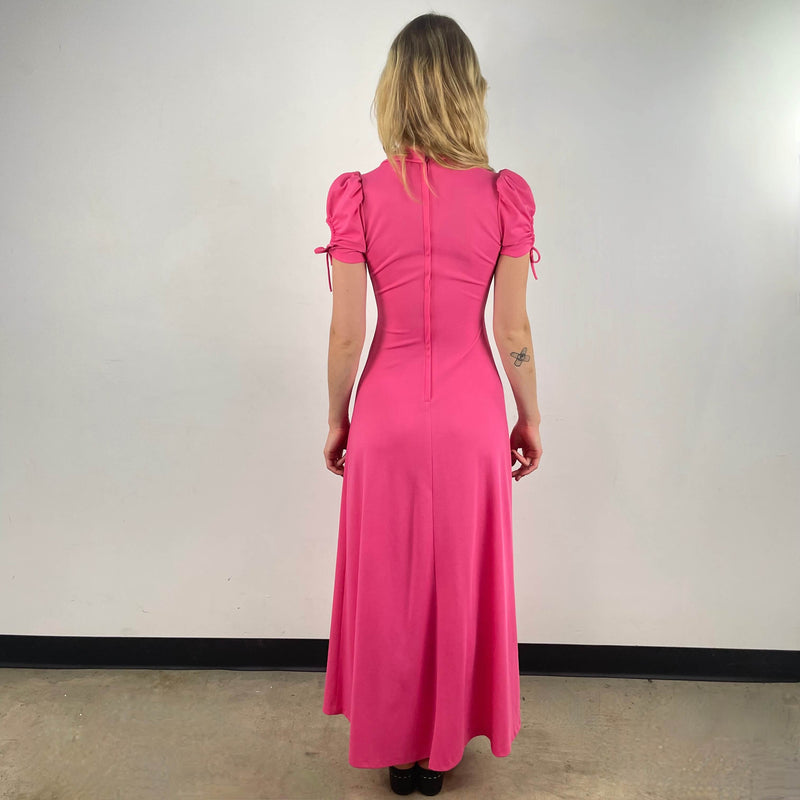 Back View of Front View of 1970s Short Sleeve Flared Pink Maxi Dress Size Small sold At bohemevintage.com Montreal