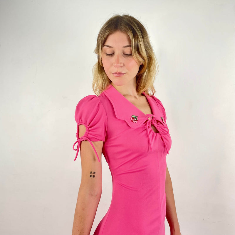 Front View of 1970s Short Sleeve Flared Pink Maxi Dress Size Small sold At bohemevintage.com Montreal