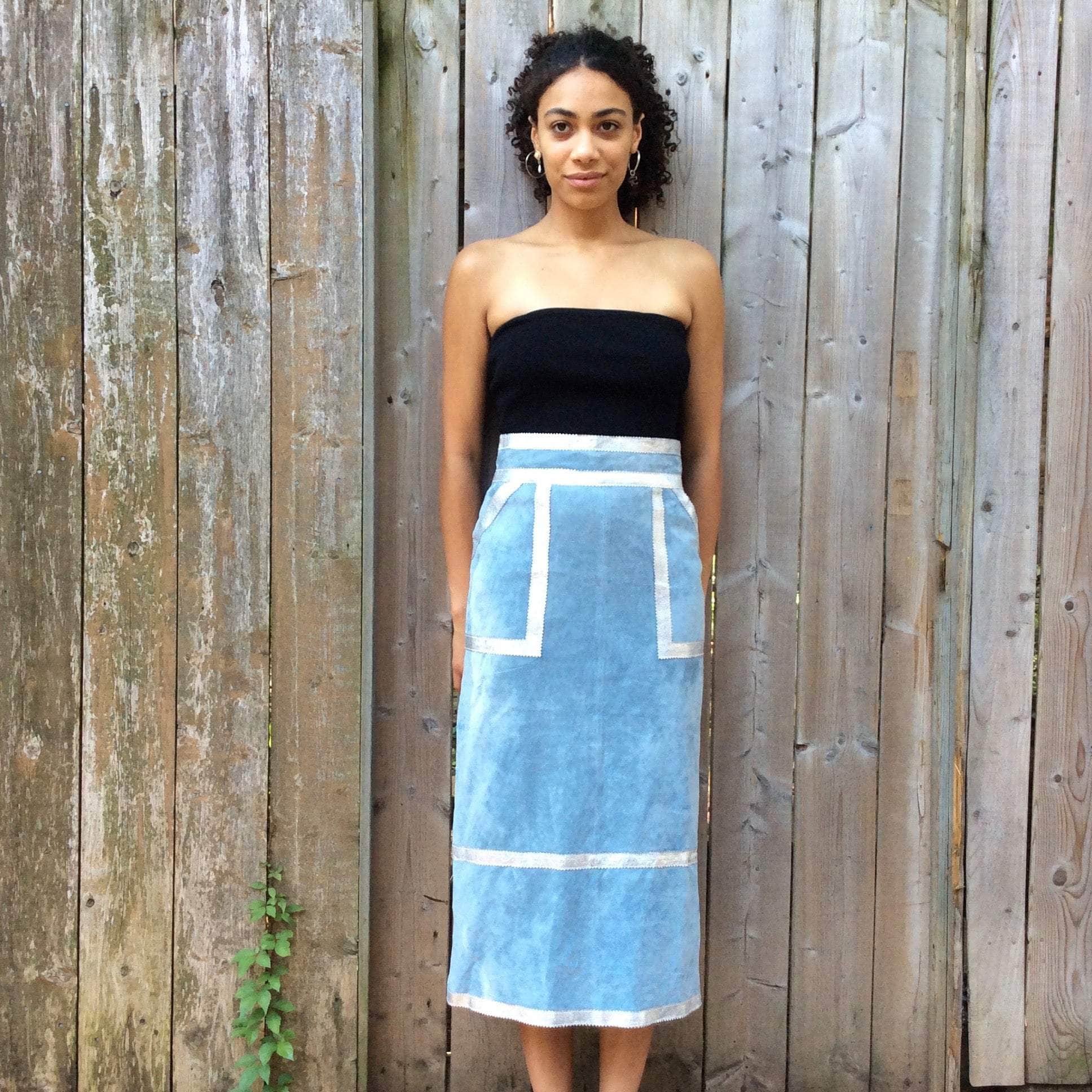 Boheme Vintage 1990s Y2K baby blue suede midi skirt with silver leather trim and patch pockets.