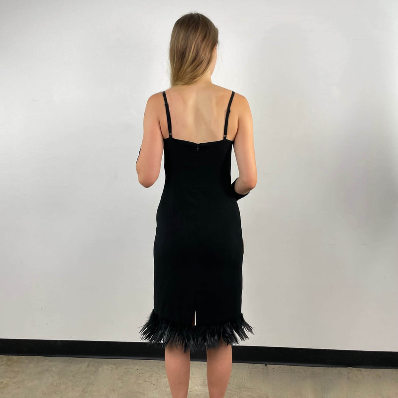 Back view of 1990s Black Slip Dress with Feathers Size small-Medium sold on bohemevintage.com Montreal