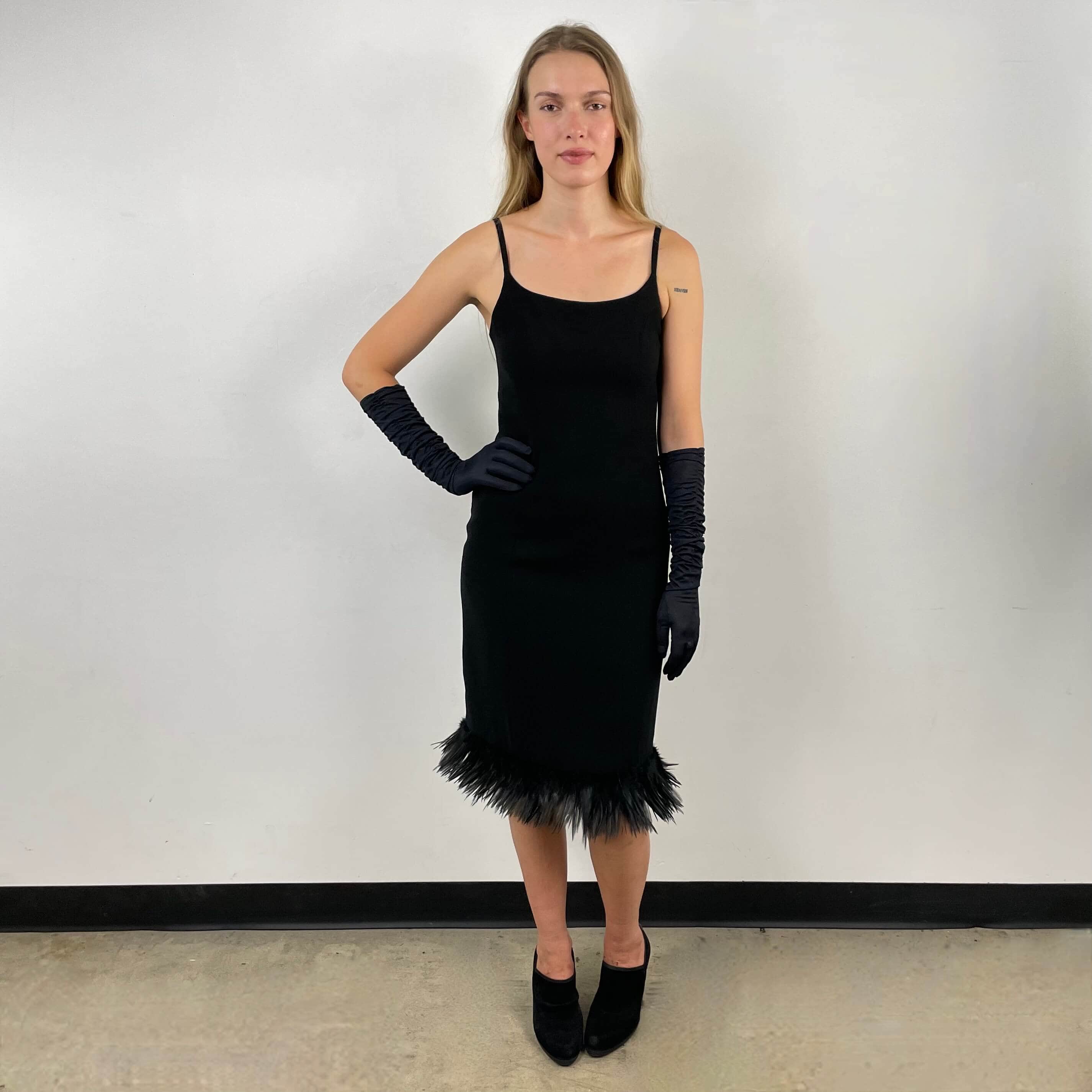 Front view of 1990s Black Slip Dress with Feathers Size small-Medium sold on bohemevintage.com Montreal