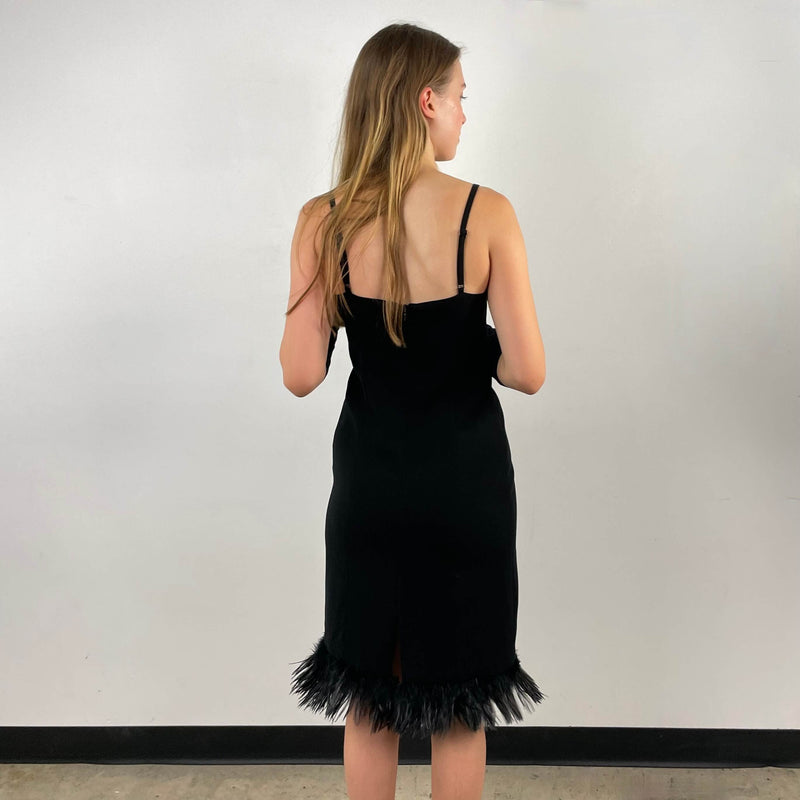 Back view of 1990s Black Slip Dress with Feathers Size small-Medium sold on bohemevintage.com Montreal