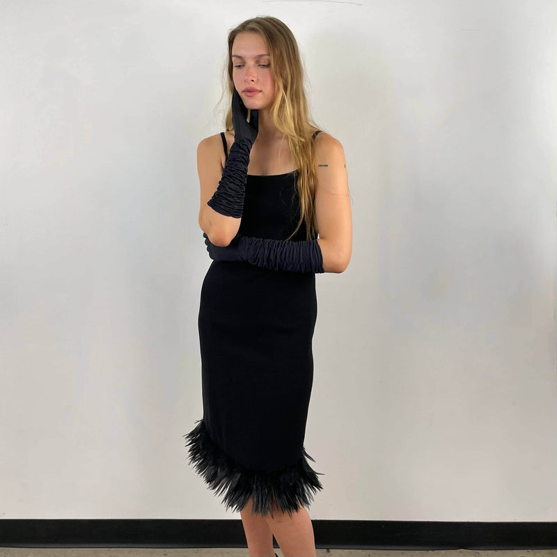 Front view of 1990s Black Slip Dress with Feathers Size small-Medium sold on bohemevintage.com Montreal