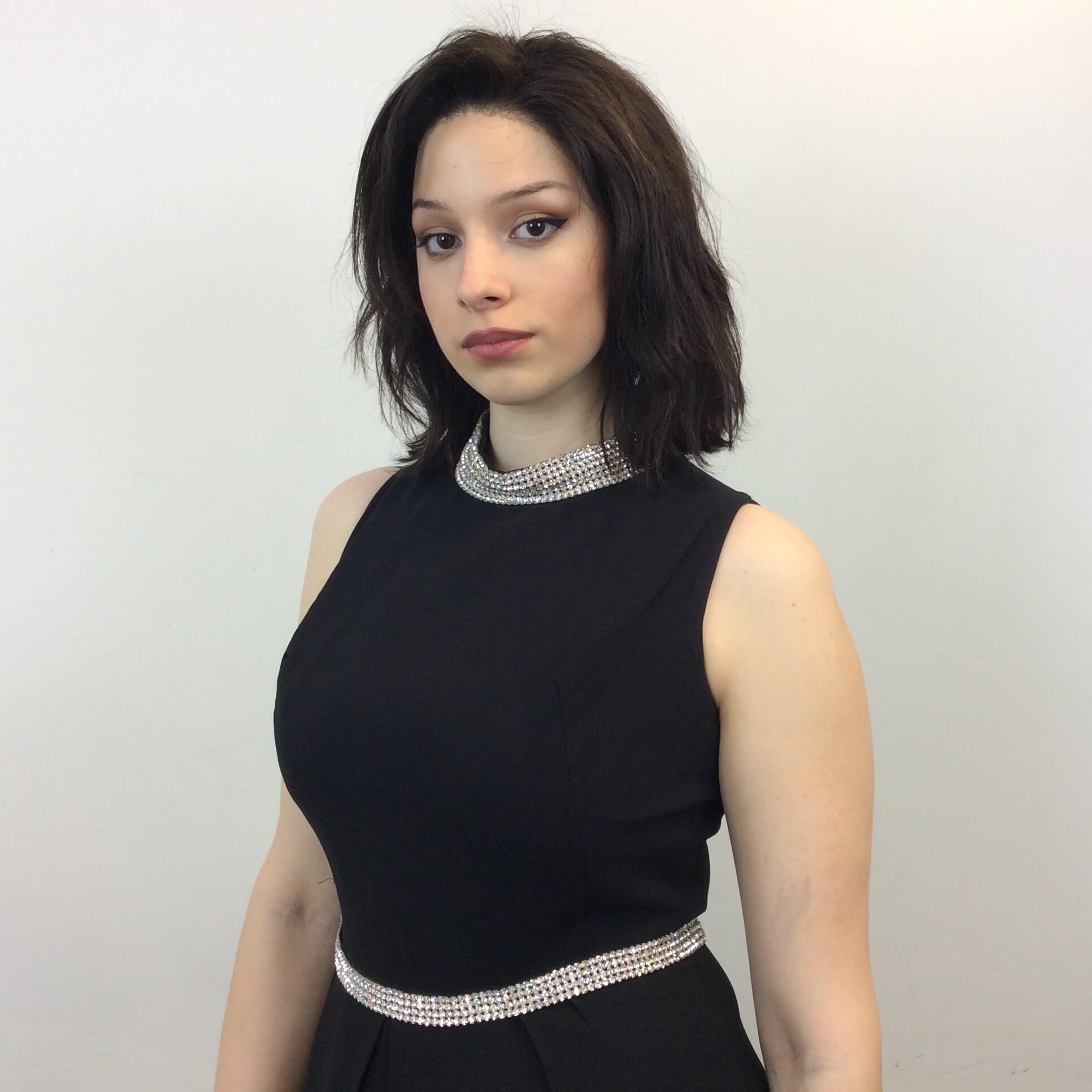 Close up view of 1960s Wide Leg Black Evening Jumpsuit Size Medium sold at bohemevintage.com Montreal