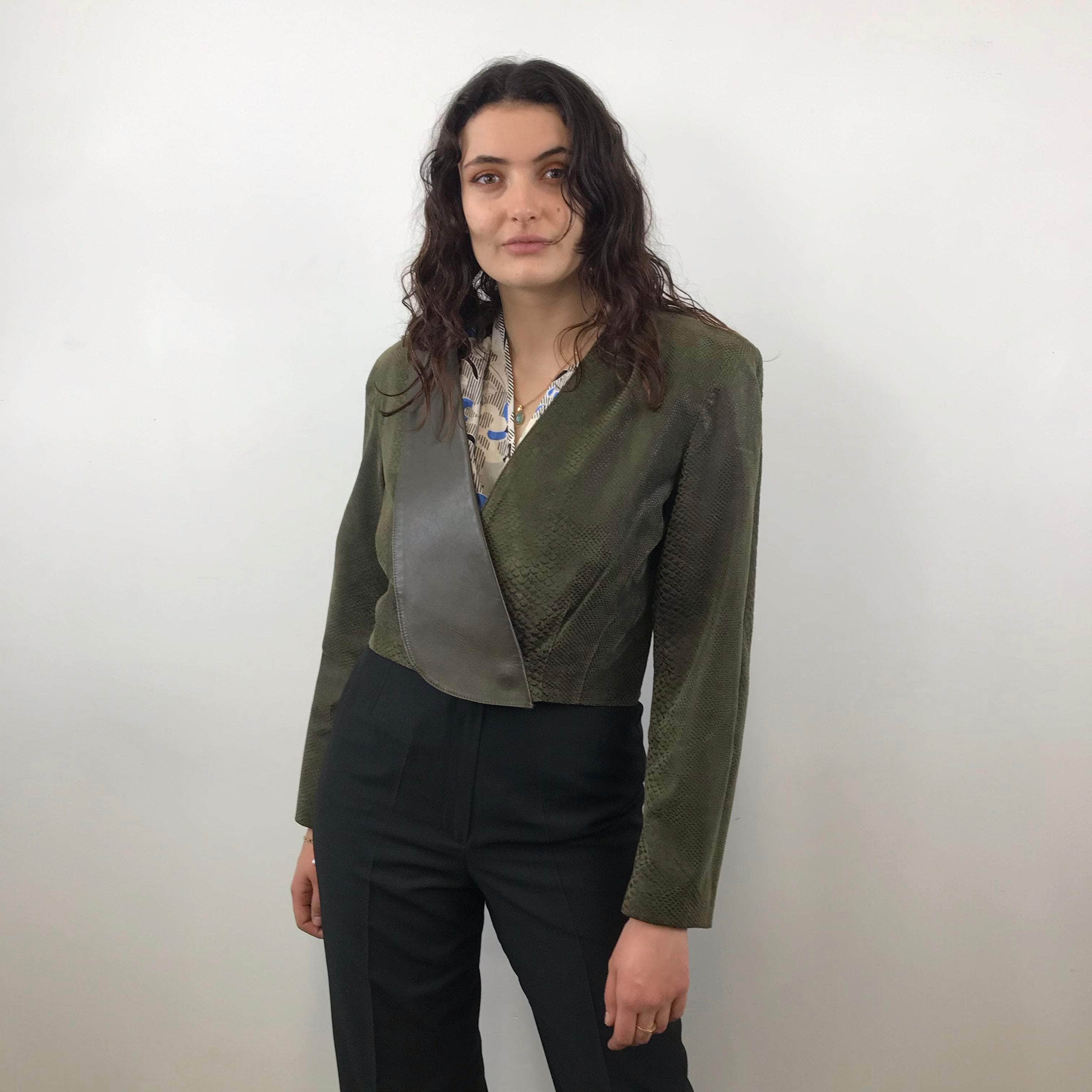 Front view of 1980s Danier Cropped Leather Jacket size Medium  sold at bohemevintage.com Montreal