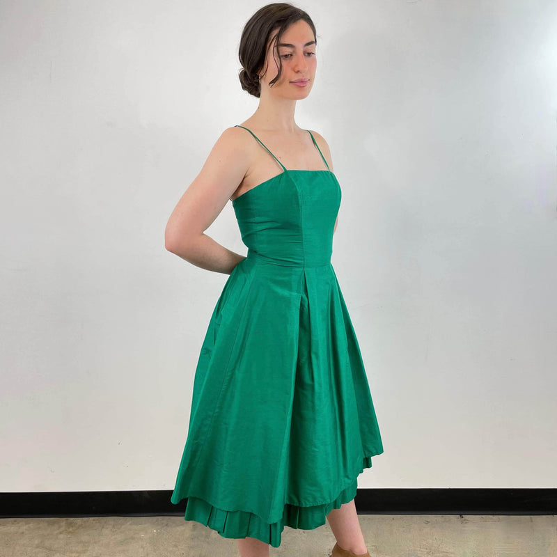 Side view of Emerald Green Silk Cocktail Dress Size Small / Medium sold by at bohemevintage.com Montreal