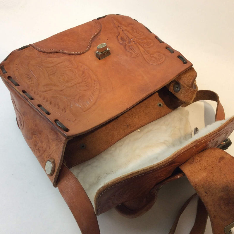 Inside view of 1970's Saddle Tooled Leather Shoulder Bag sold at bohemevintage.com