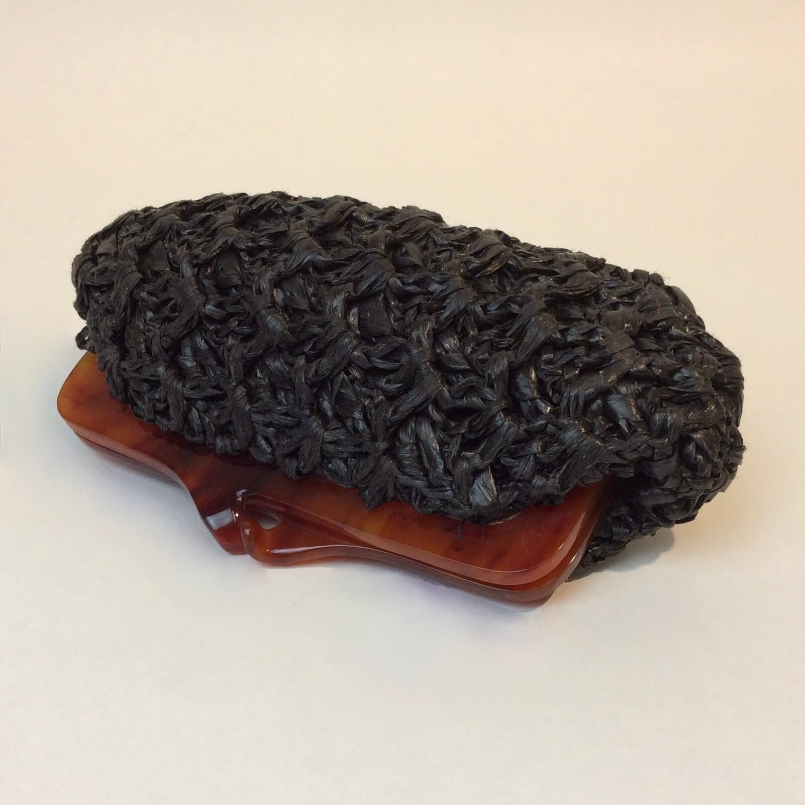 1960s Small Black Crocheted Raffia Evening Clutch sold at bohemevintage.com Montreal