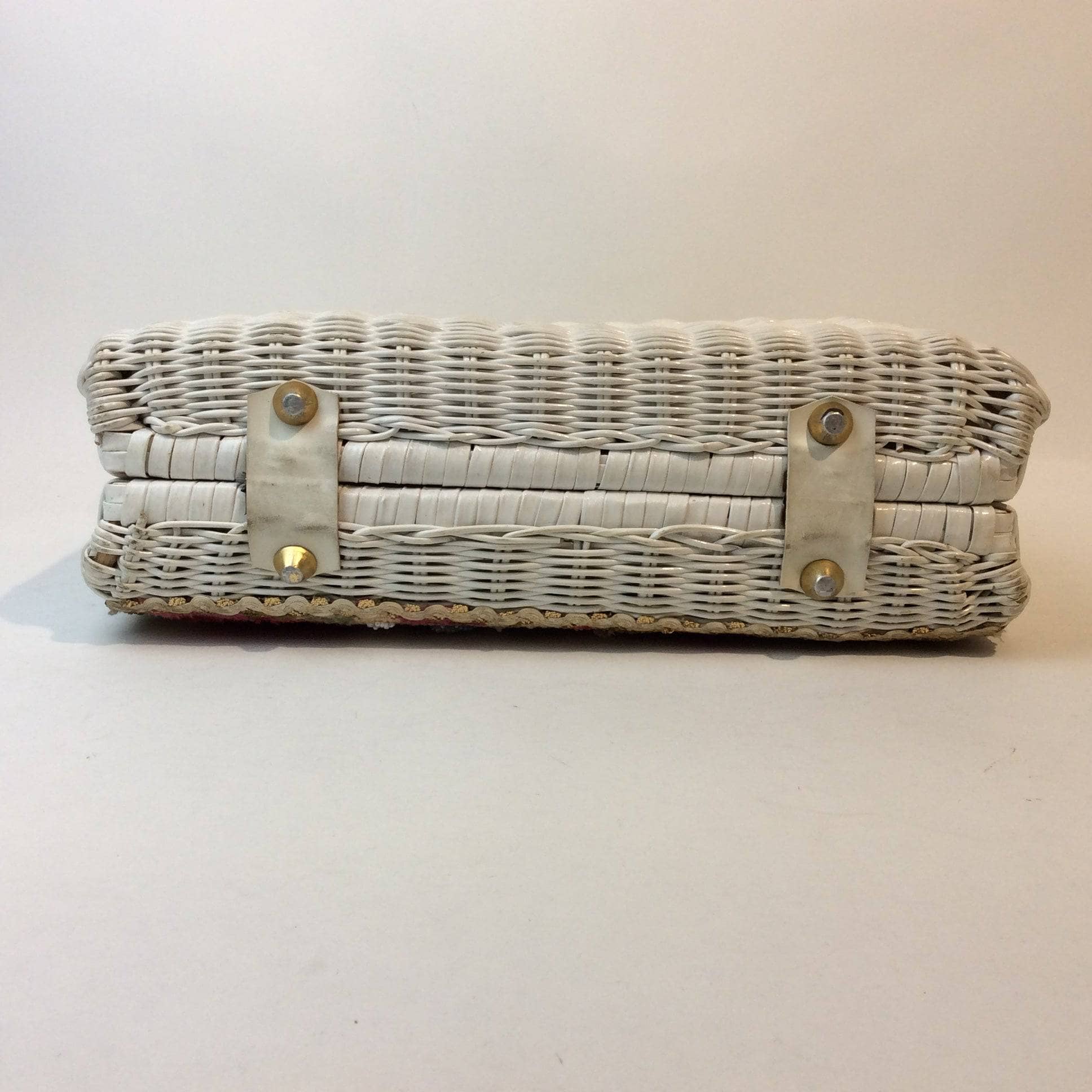 Bottom view of 1950s-60s Floral Needlepoint Wicker Basket Purse sold by bohemevintage.com Montreal