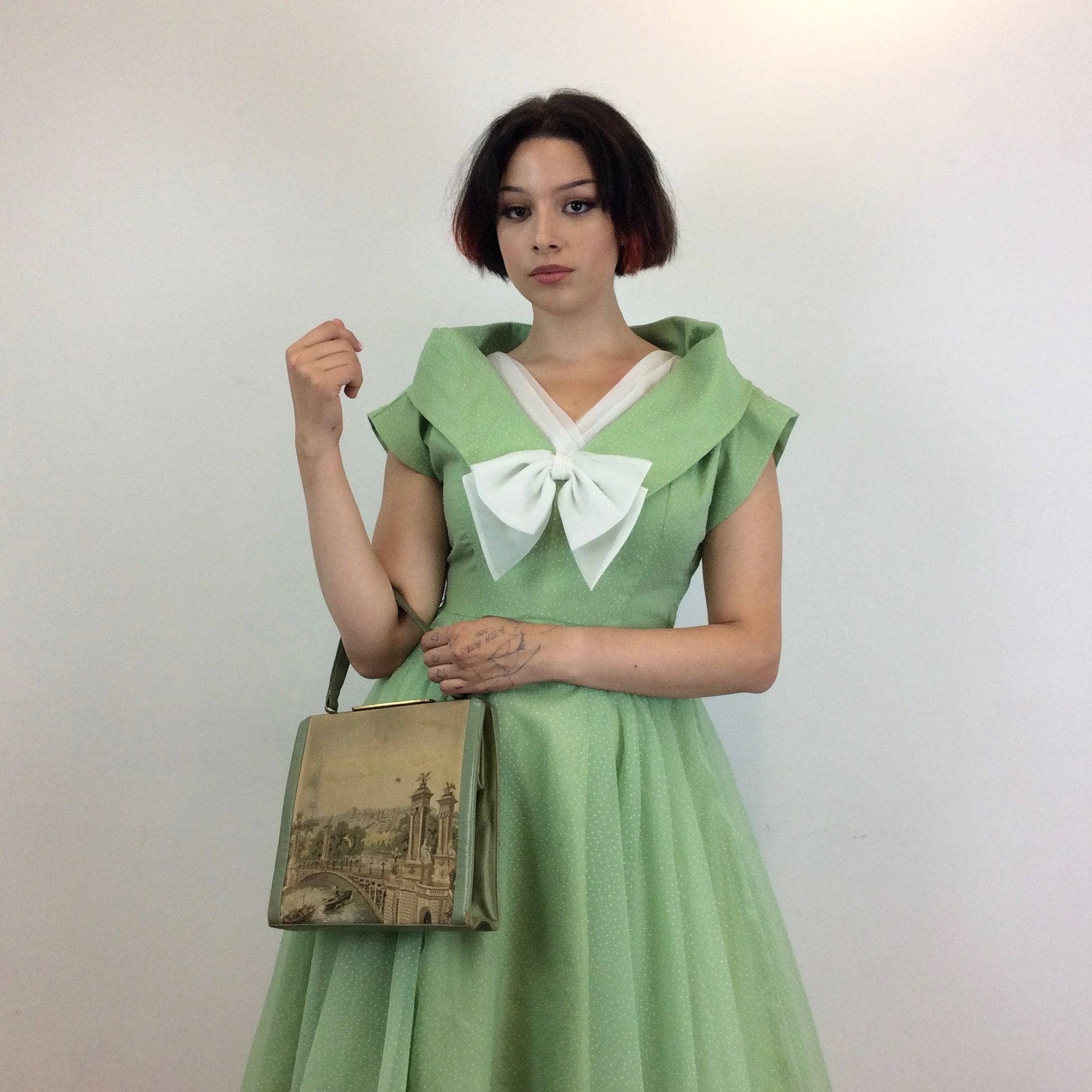 1950s Apple Green Flock Dot Chiffon , Short Sleeve, Full Skirt Dress, Size Medium, Short sleeves, Big Collar With 1950s Tapestry Handbag sold by bohemevintage.com Montréal