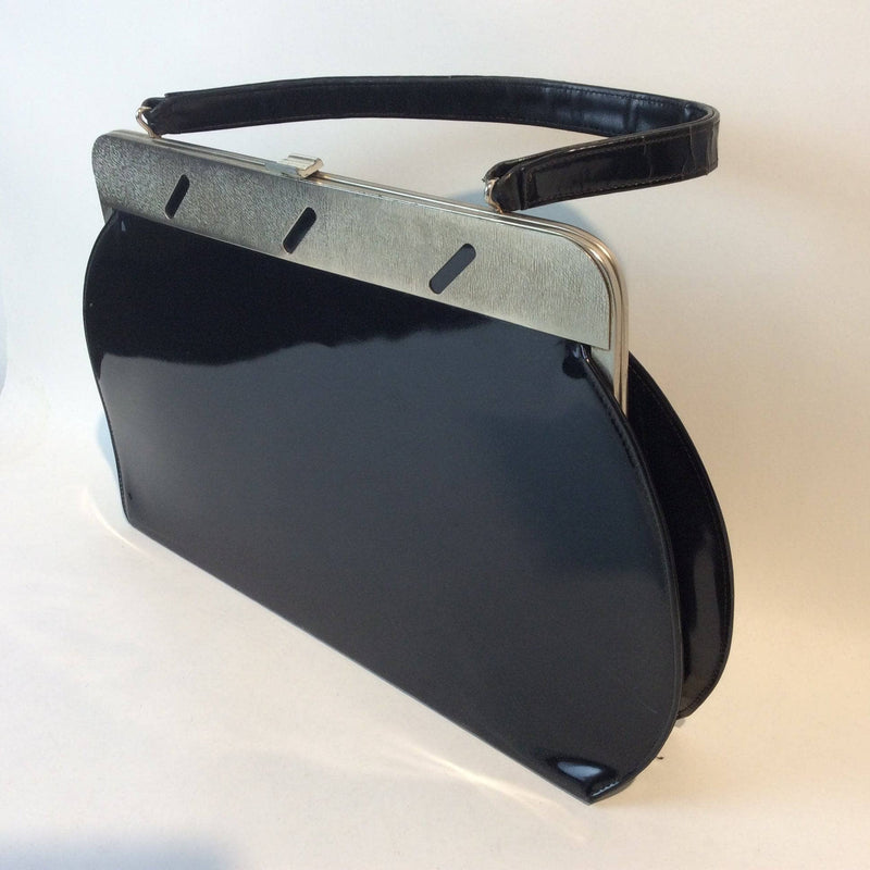 1950s Black Faux Patent Leather Oversized Frame Bag. Sold by bohemevintage.com Montréal