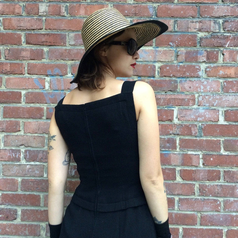 Back view close up of 1950s Black Sleeveless Wool Cocktail Dress size Small sold by bohemevintage.com Montréal