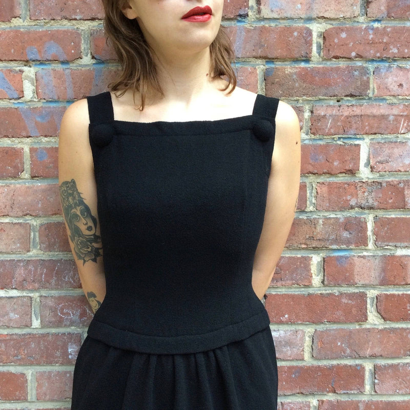Close up view of 1950s Black Sleeveless Wool Cocktail Dress size Small sold by bohemevintage.com Montréal