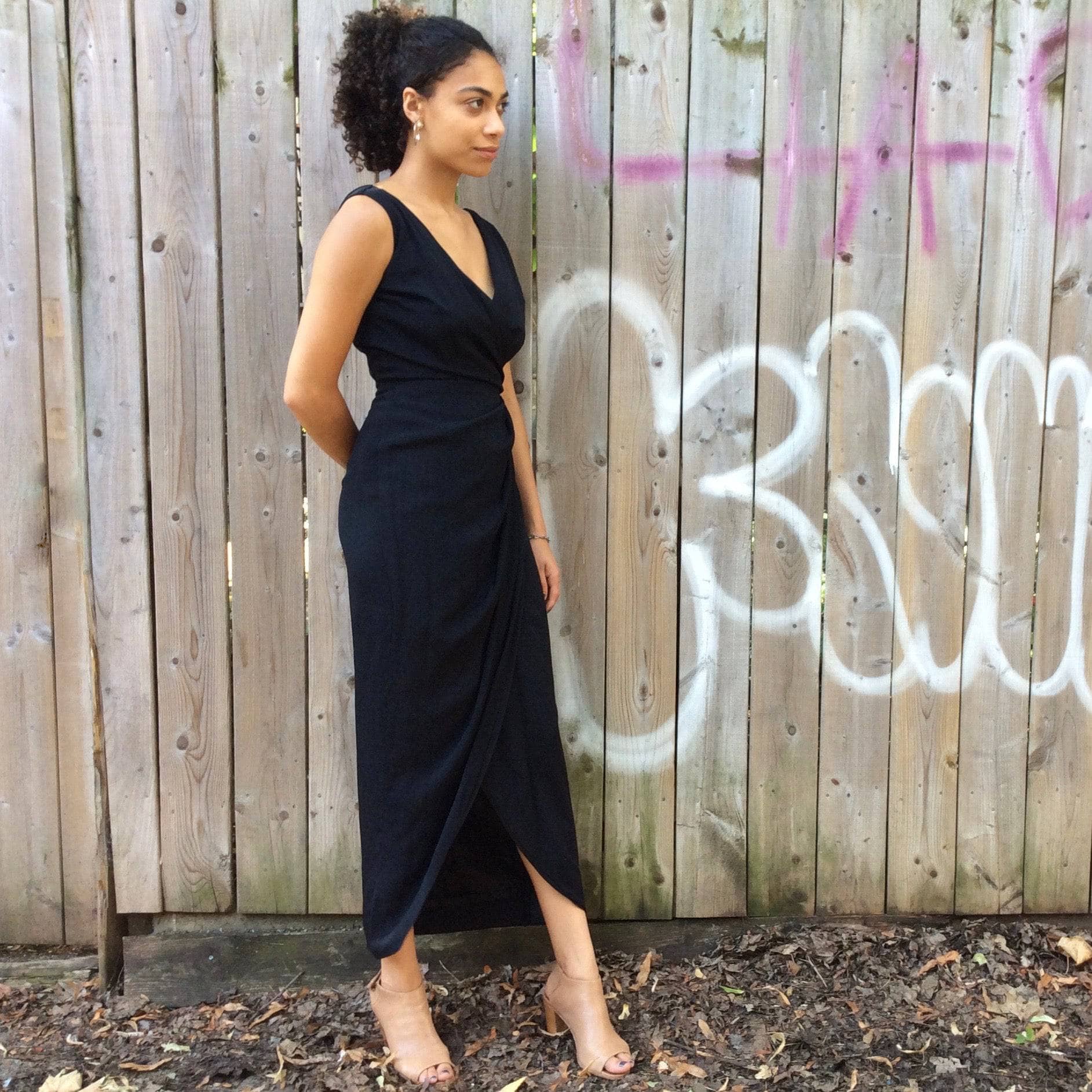 Side view of  1950s Black Maxi Sleeveless Wrapped Gown, size Small sold by bohemevintage.com Montreal 