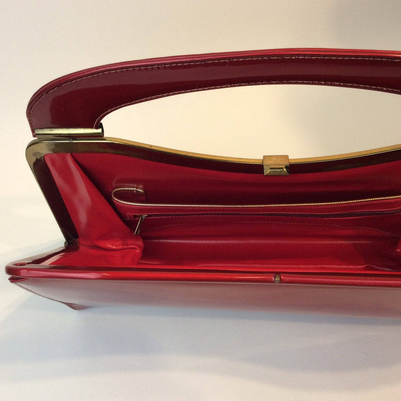 Inside View of 1950s Glossy Red Handbag sold by bohemevintage.com Montreal