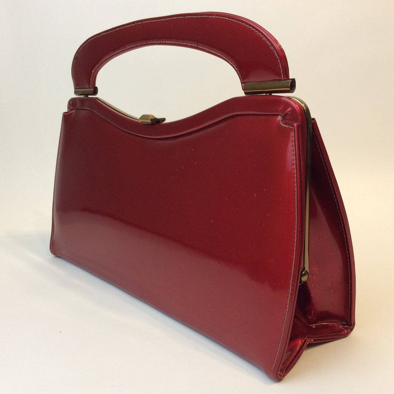 1950s Glossy Red Handbag sold by bohemevintage.com Montreal