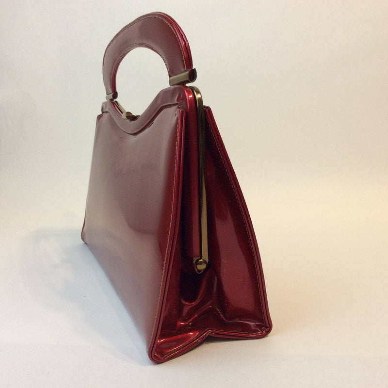1950s Glossy Red Handbag sold by bohemevintage.com Montreal