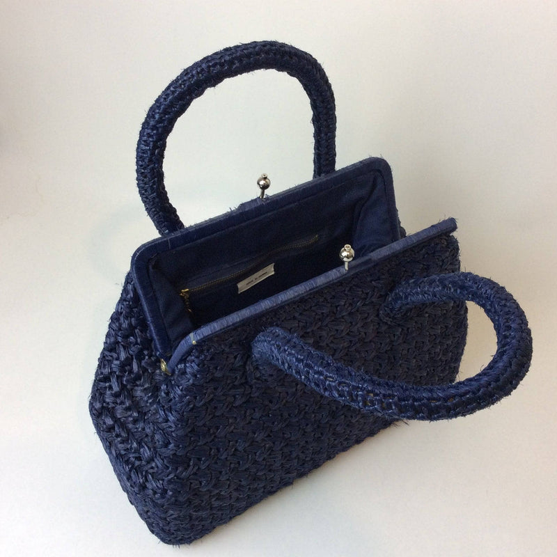 Open view of 1950s Midnight Blue Raffia Crocheted Frame Bag sold by bohemevintage.com Montreal