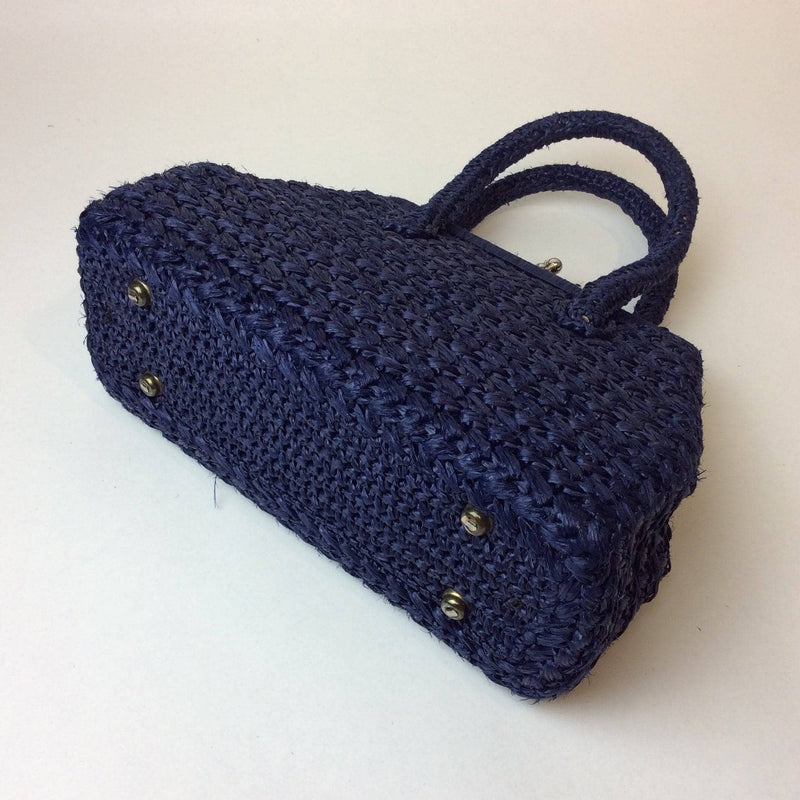 Bottom view of 1950s Midnight Blue Raffia Crocheted Frame Bag sold by bohemevintage.com Montreal