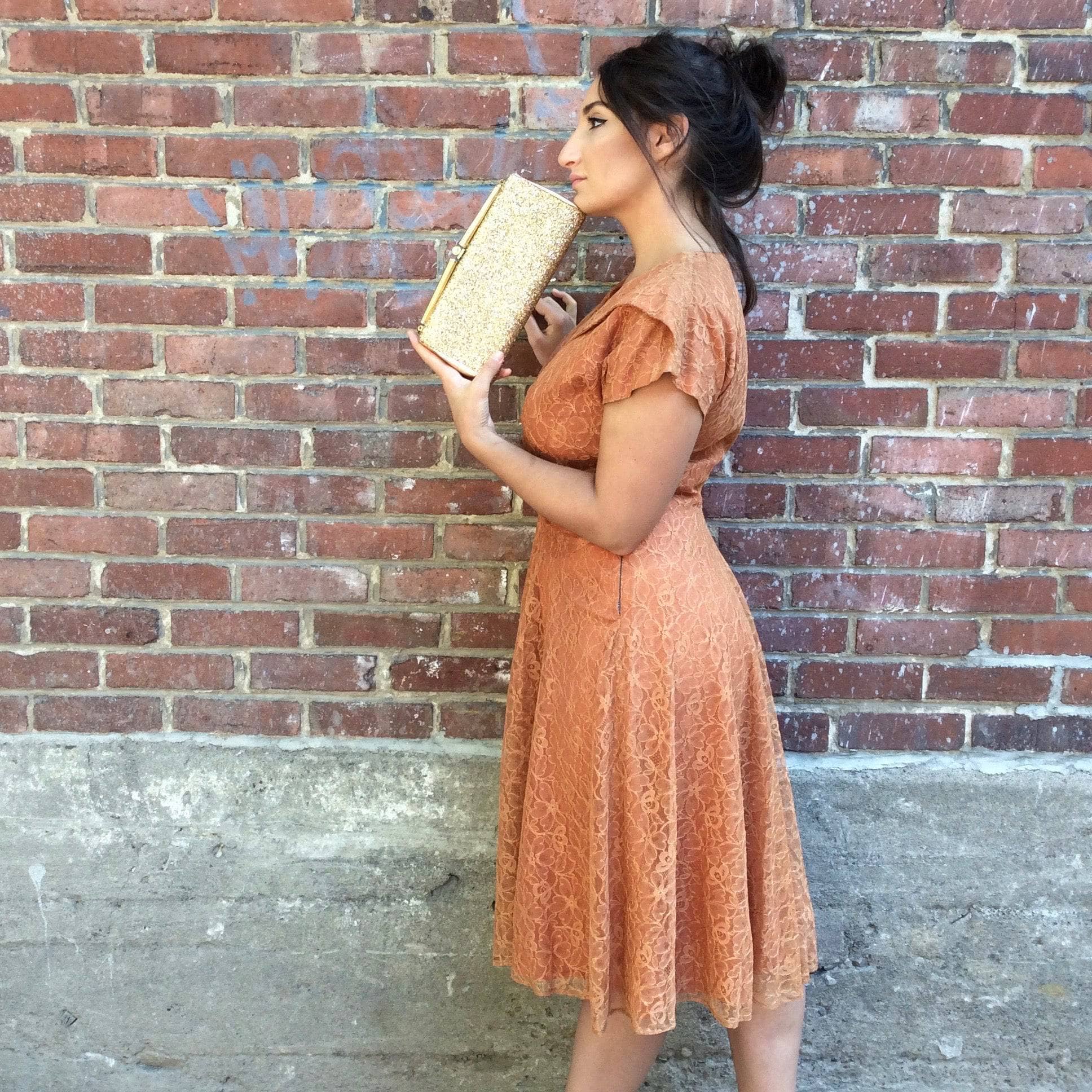 Side view of 1950s Short Sleeve Copper Lace Dress size Medium sold by bohemevintage.com Montreal 