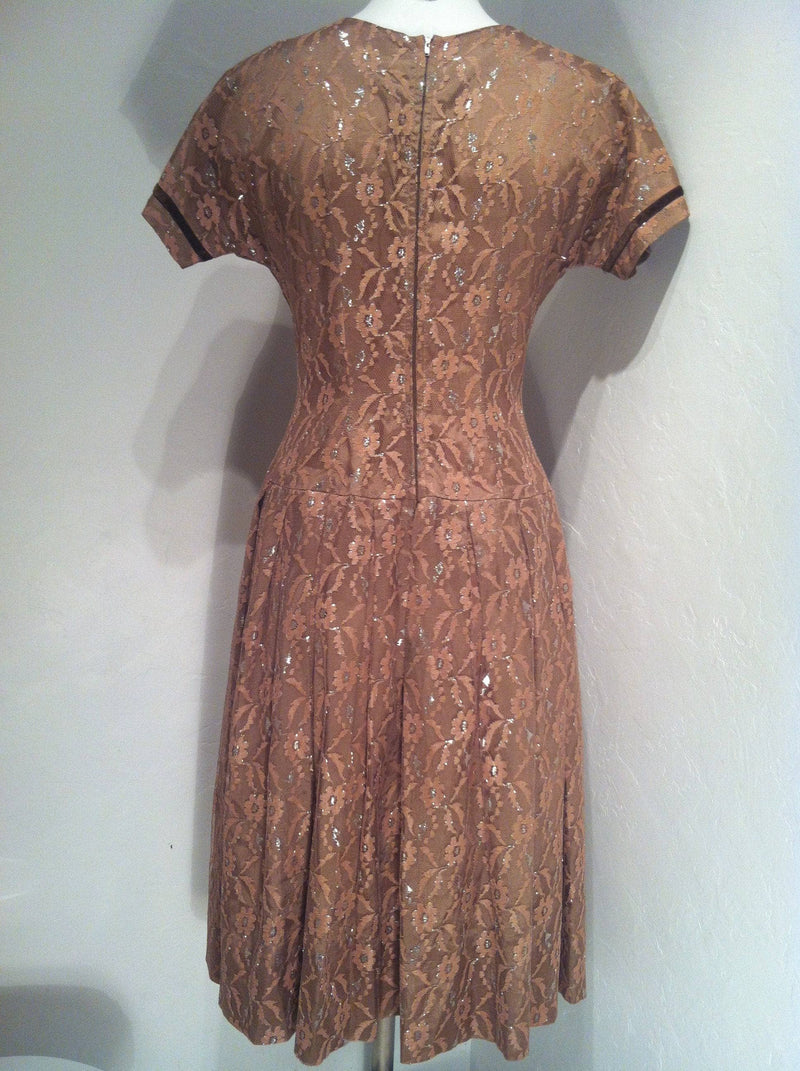 Backside View of 1950s Short Sleeve Latte Colour Lace Midi Dress Size Small sold by bohemevintage.com Montreal 