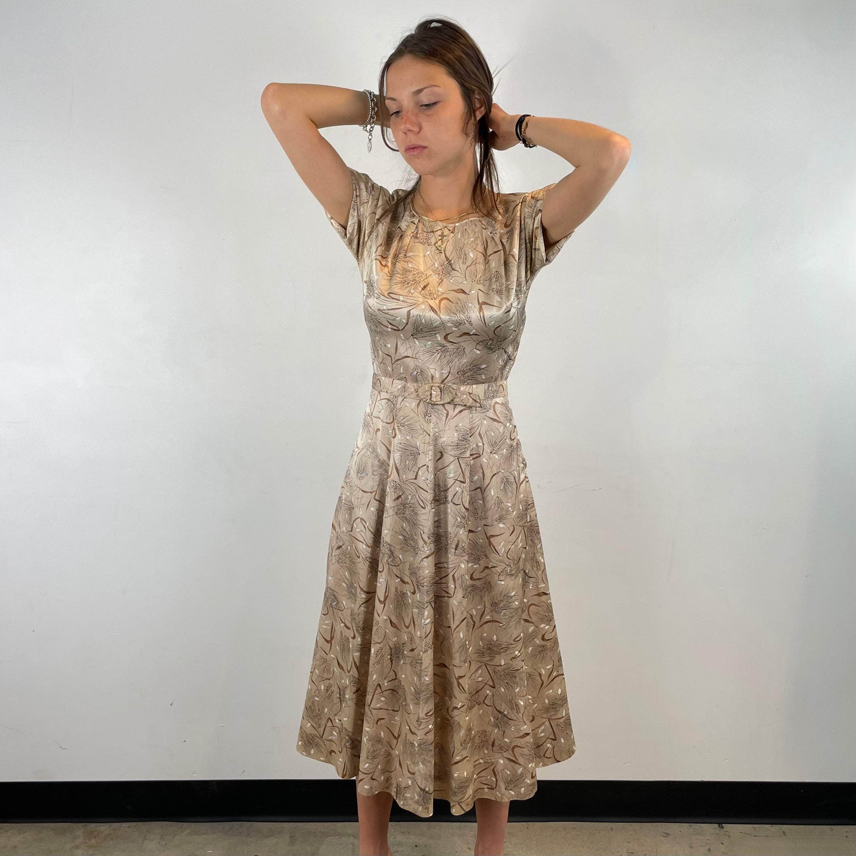 1950s Short-Sleeve Satin Flared Midi Dress Size X-Small / Small sold at bohemevintage.com Montreal