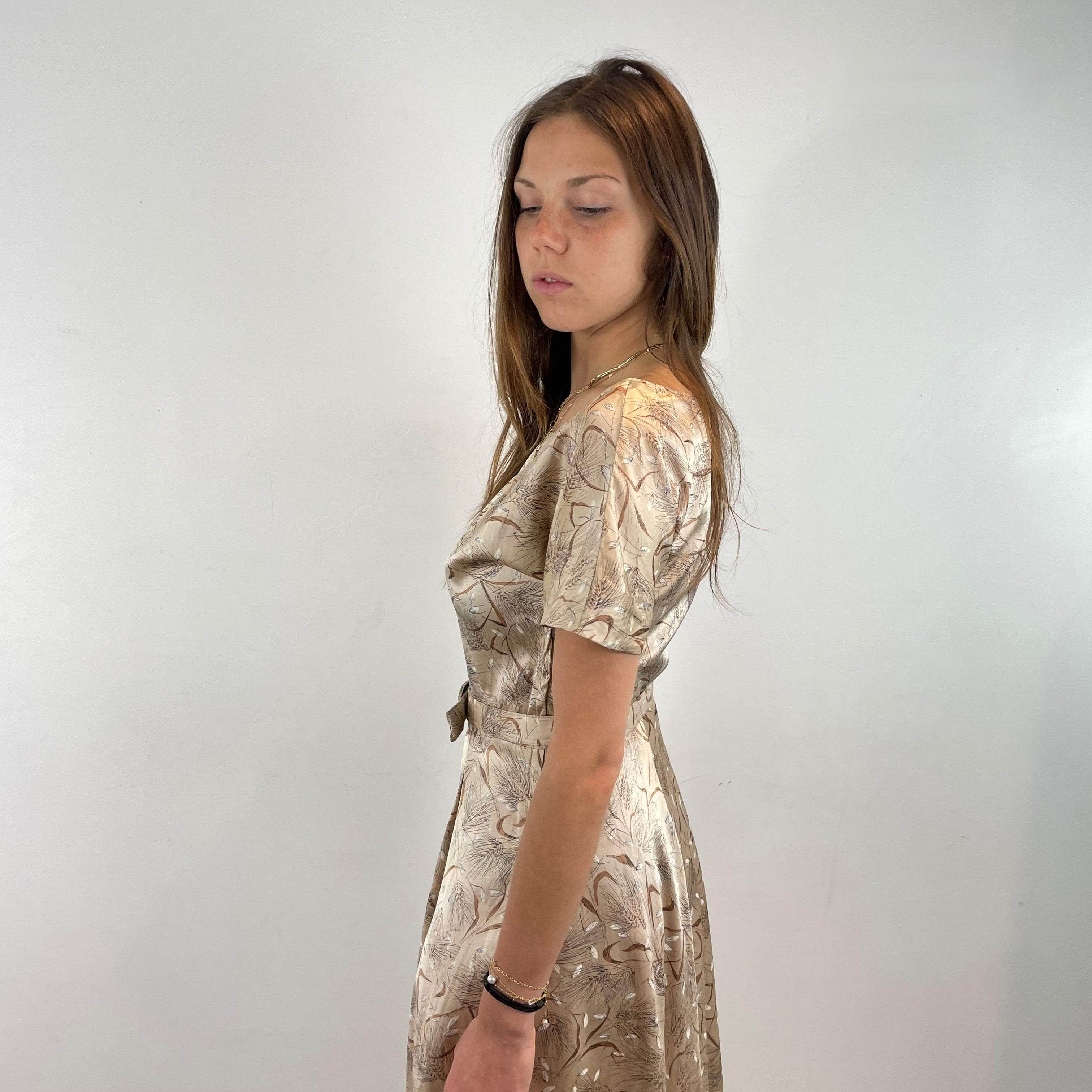 Side view of top of 1950s Short-Sleeve Satin Flared Midi Dress Size X-Small / Small sold at bohemevintage.com Montreal