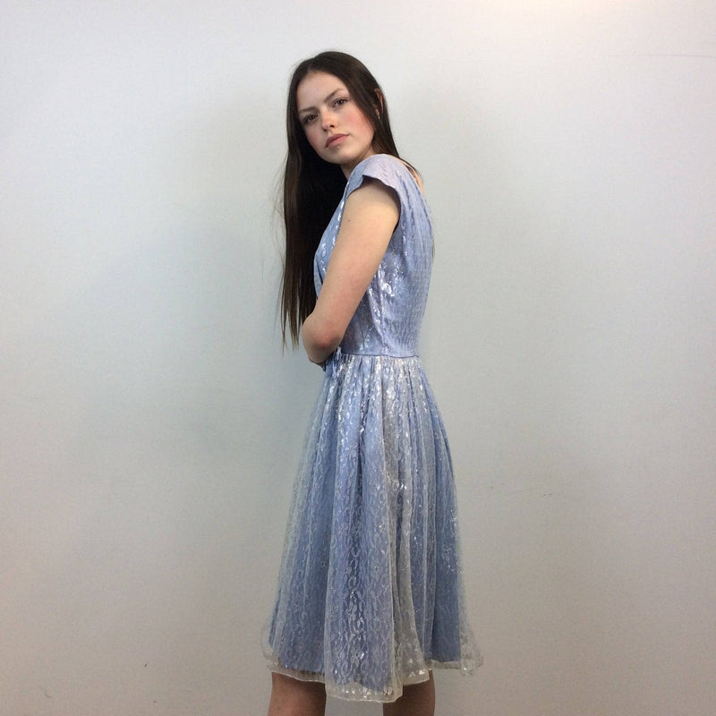 Side view of 1950s Silver Lace Party Dress, Fit and Flare Dress, size Small-Medium, Colour Blue sold at bohemevintage.com Montreal