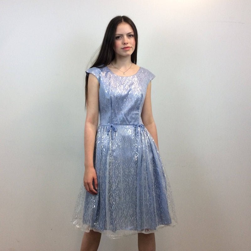Front view of 1950s Silver Lace Party Dress, Fit and Flare Dress, size Small-Medium, Colour Blue sold at bohemevintage.com Montreal