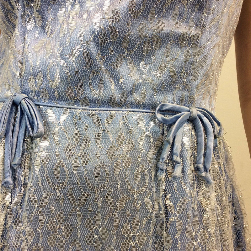 Waist  detailing of 1950s Silver Lace Party Dress, Fit and Flare Dress, size Small-Medium, Colour Blue sold at bohemevintage.com Montreal
