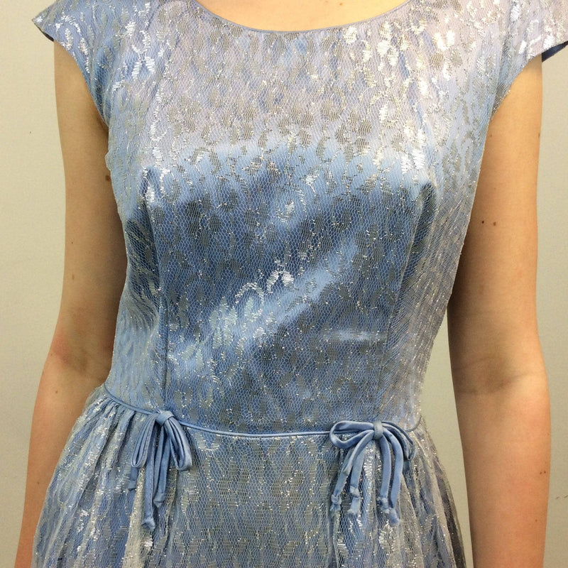 Close up view of 1950s Silver Lace Party Dress, Fit and Flare Dress, size Small-Medium, Colour Blue sold at bohemevintage.com Montreal