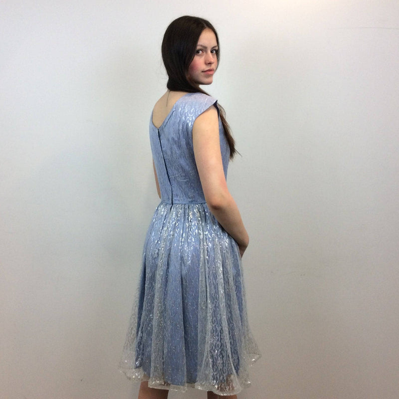 Back  view of  1950s Silver Lace Party Dress, Fit and Flare Dress, size Small-Medium, Colour Blue sold at bohemevintage.com Montreal