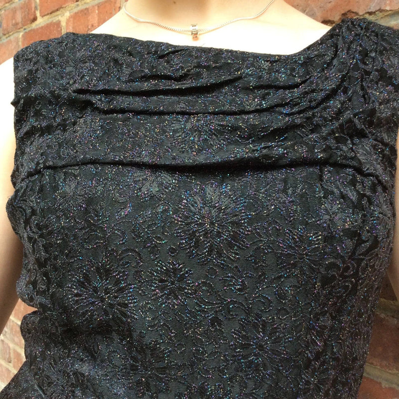 Top Close-up of 1950s Sleeveless Knee-length Black Brocade Dess Size Small sold by bohemevintage.com Montreal 