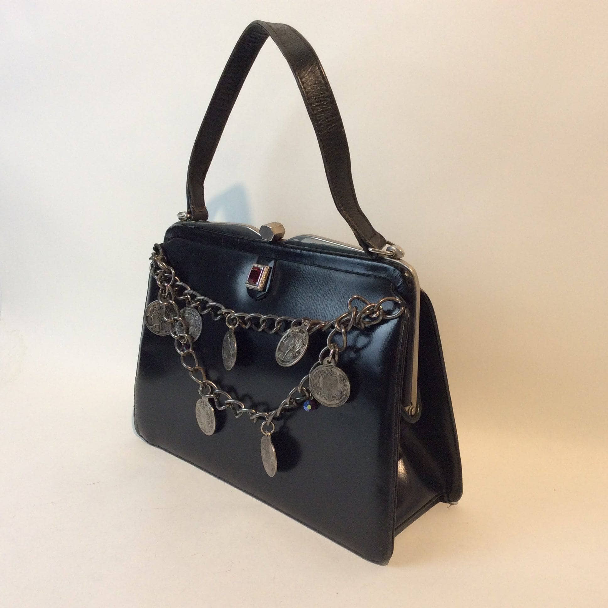 1950s "Capri" Up-cycled Black Leather Frame Handbag sold by bohemevintage.com Montreal 