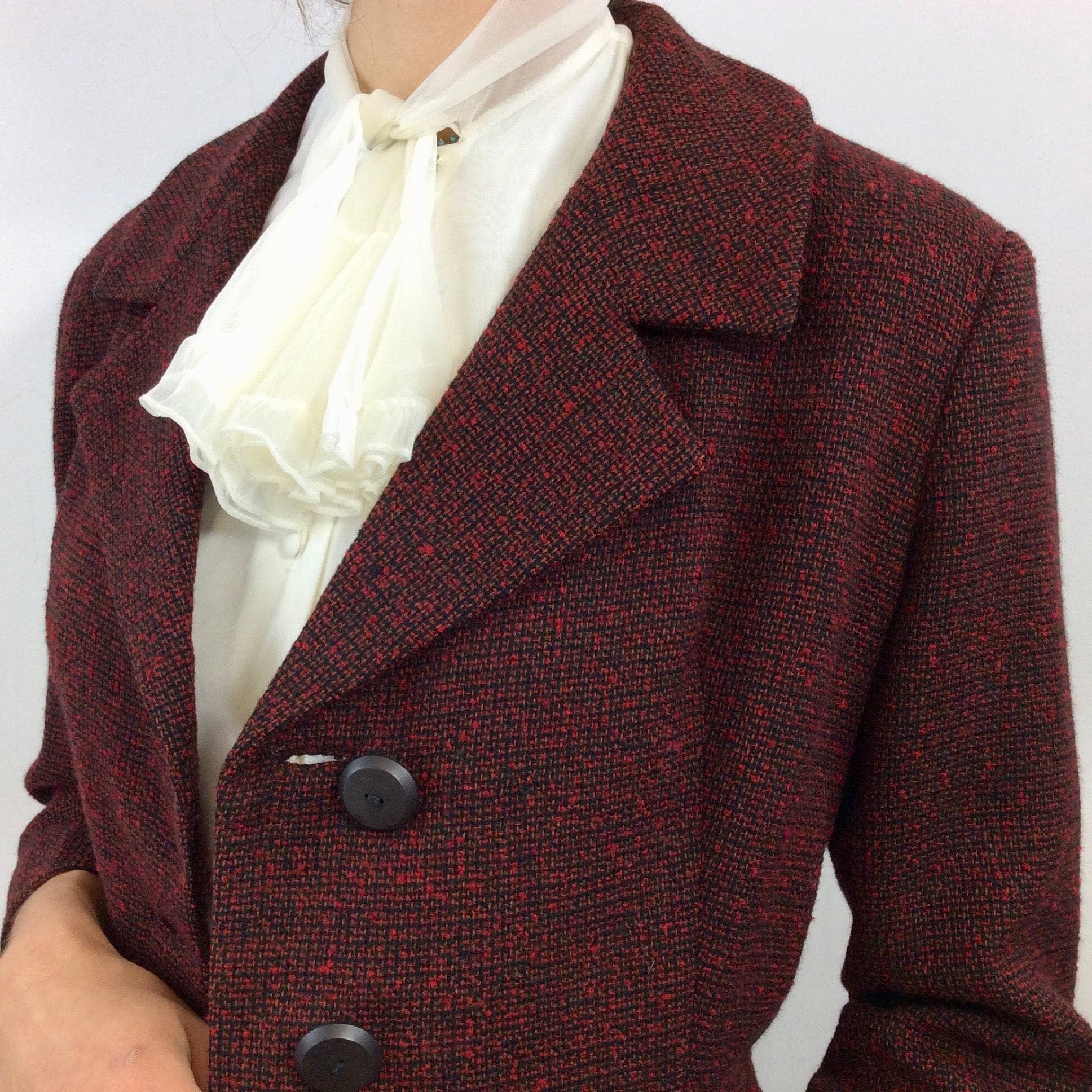 Close up view of fabric of 1950s Wool Blazer and Skirt Set Size Small-Medium sold by bohemevintage.com Montreal 