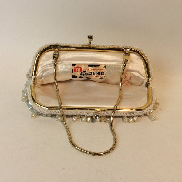 Inside View with Label  of 1960's "Geo Mercier" Ivory Bead and Sequin Evening Bag Clutch sold by bohemevintage.com Montréal