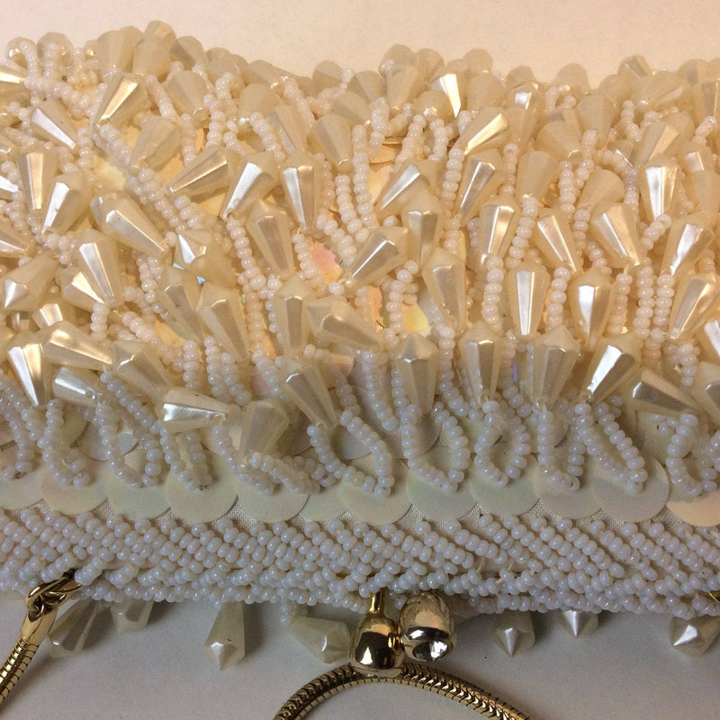 Close-Up of Clasp of 1960's "Geo Mercier" Ivory Bead and Sequin Evening Bag Clutch sold by bohemevintage.com Montréal