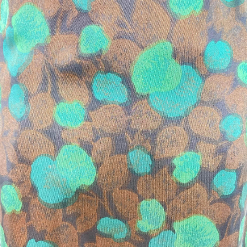 Close up view of fabric print of 1960s-70s Long Sleeved Sheath Dress Size Small/Medium sold at bohemevintage.com Montreal